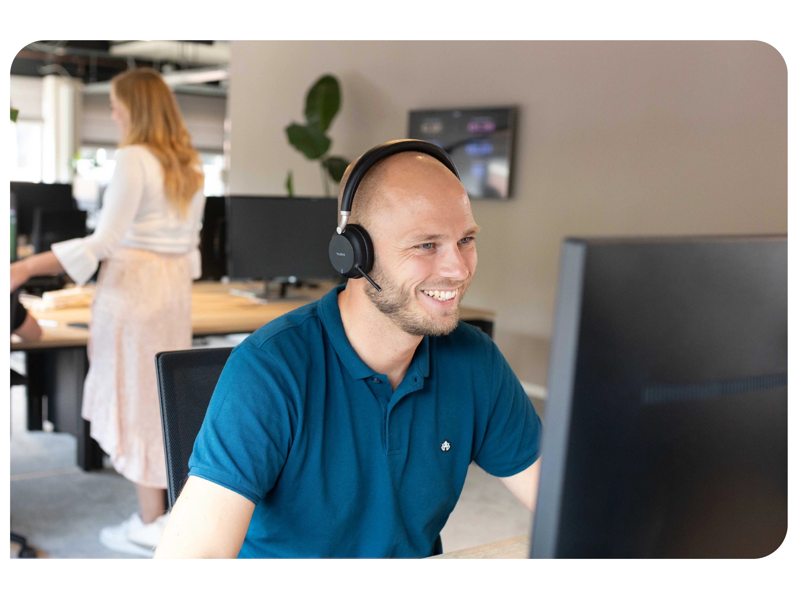 Employee making a call at their workplace.